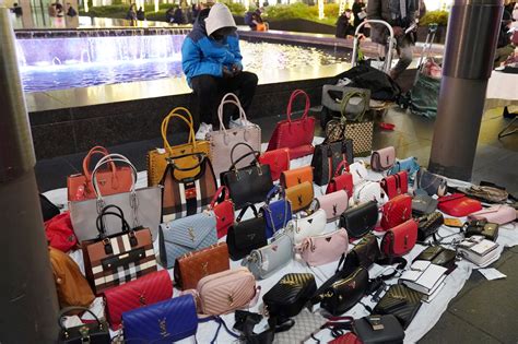 can you sell fake bags on ebay|selling designer bags is illegal.